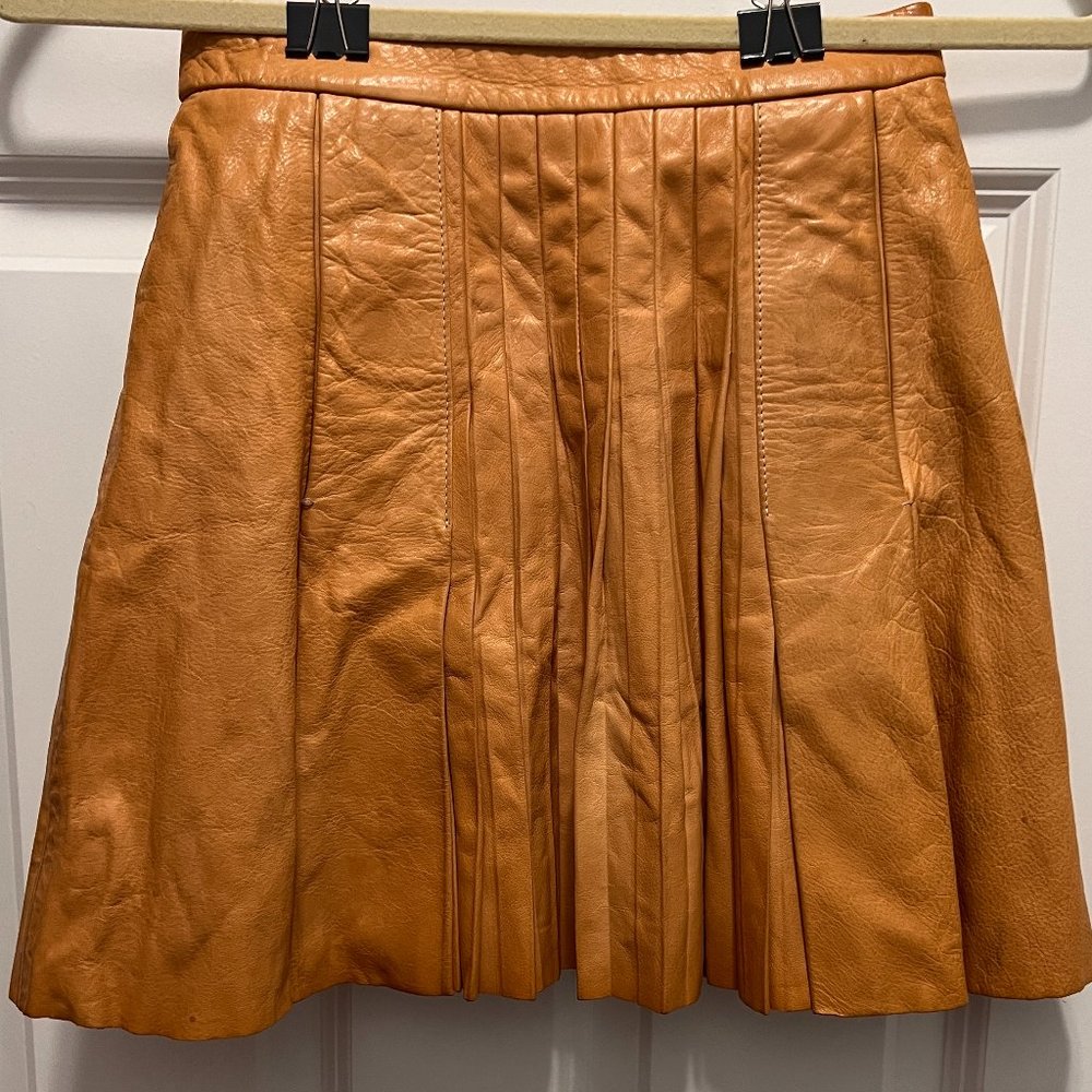 H&M Conscious Exclusive Tan Leather Pleated Mini Skirt
Very small size 4